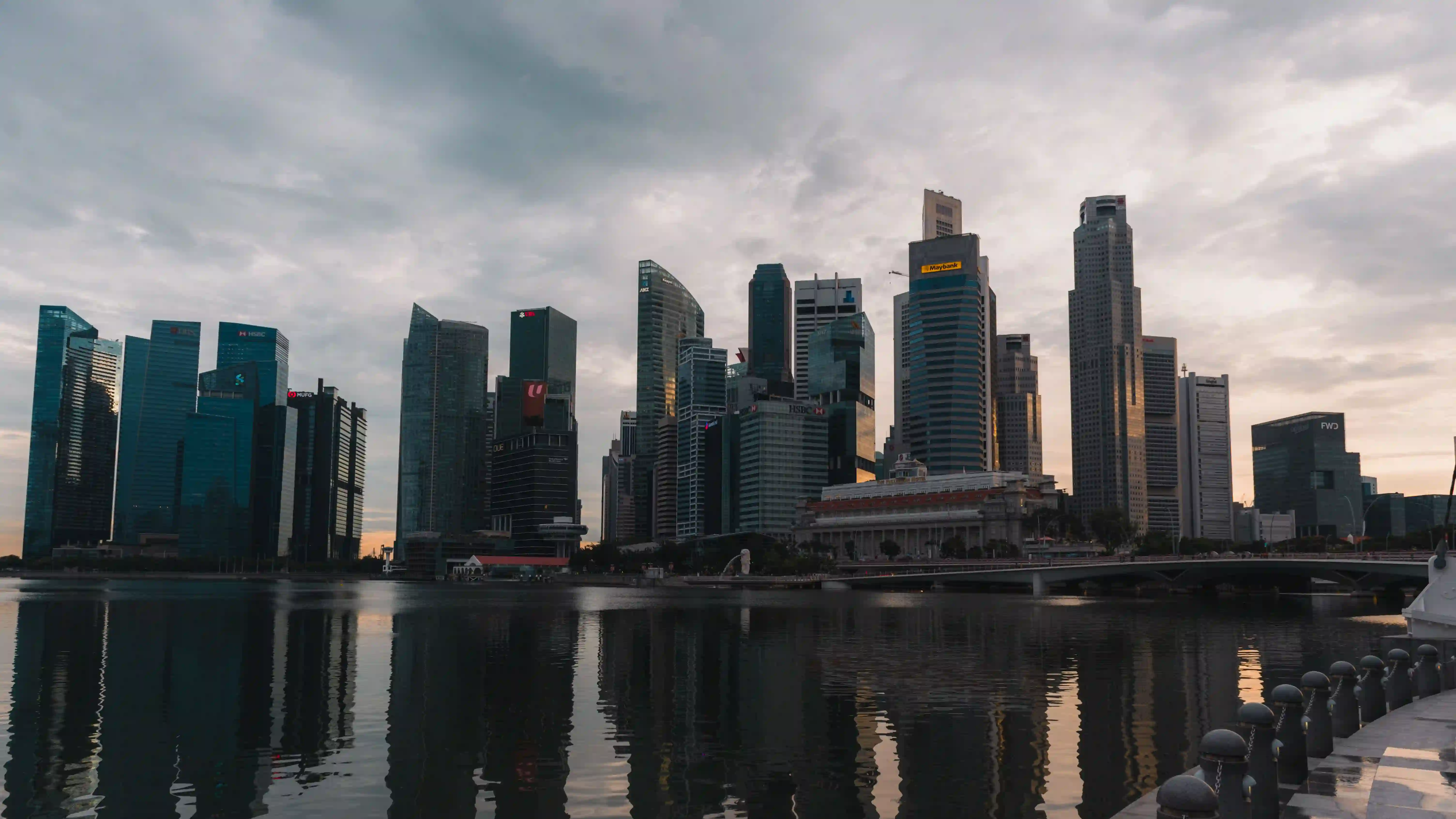 Singapore skyline across the water at dusk